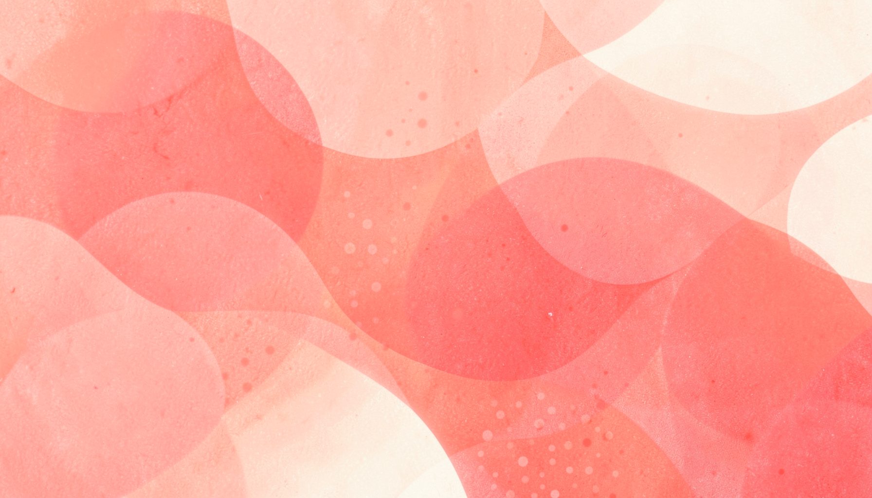 Soft abstract texture of overlapping translucent circles in coral pink and pale cream, creating a warm dreamy atmosphere with subtle dot patterns